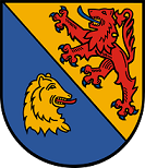 Schild schrägrechts geteilt, rechts in Blau ein rotgezungter goldener Bärenkopf, links in Gold ein blaubewehrter und -gezungter roter Löwe.