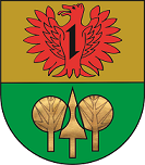 In geteiltem Schild oben in Gold ein rotes Fabeltier mit einem Wolfskopf und weit geöffneten Schwingen belegt mit einem schwarzen Wolfshaken. Unten in Grün drei Bäume.