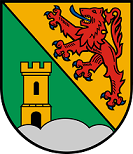 In schräggeteiltem Schild vorne in Grün ein goldener gezinnter Turm auf einem silbernen Dreiberg, hinten in Gold ein blaubewehrter und -gezungter roter Löwe.