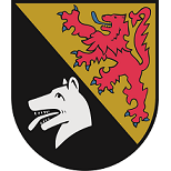 In schrägrechts geteiltem Schild, oben in Gold ein roter, blau – bewehrter und gezungter Löwe. Unten in Schwarz ein silberner Wolfskopf.  