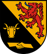 Wappen der Ortgemeinde Veitsrodt Schild schrägrechts geteilt, oben in Gold ein roter, blaubewehrter und -gezungter Löwe, unten in Schwarz ein goldener Jungstierkopf über zwei ineinander verschlungenen goldenen Händen.